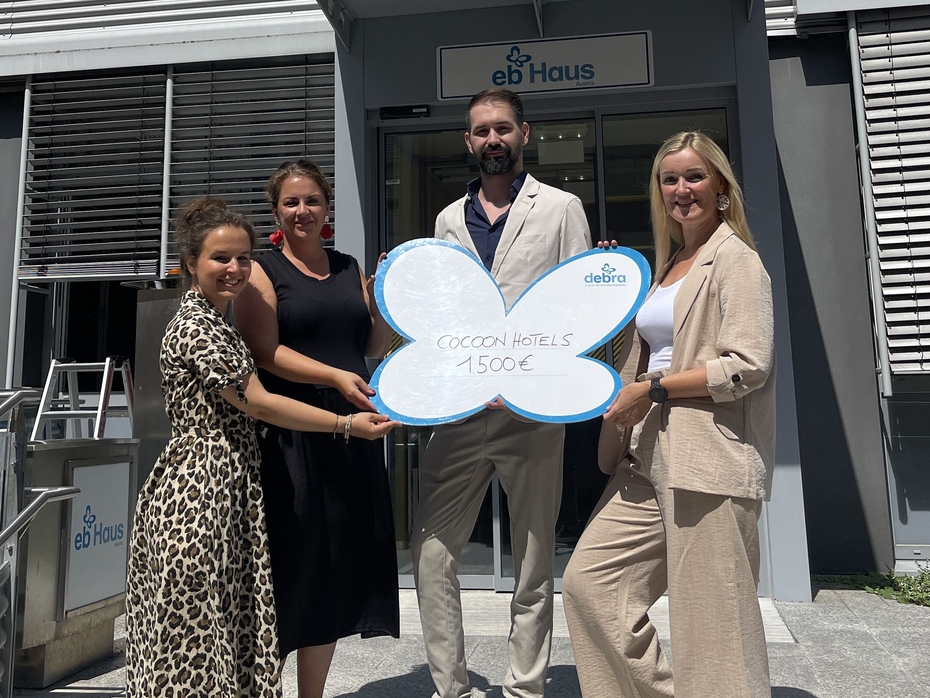 Cocoon Hotels Team bei Spendenübergabe im EB-Haus Austria